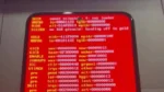 Redmi Note 12 4G menampilkan log boot XNU berwarna merah saat menjalankan iOS 16