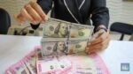 Rupiah Dibuka Stagnan di Rp17.980, Pasar Tunggu Keputusan BI Rate